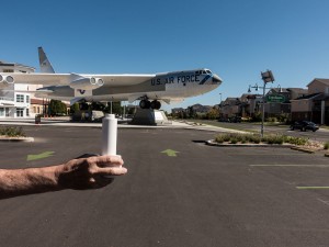 Hand holding mini-monument at the former Lowry Air Force Base, Denver